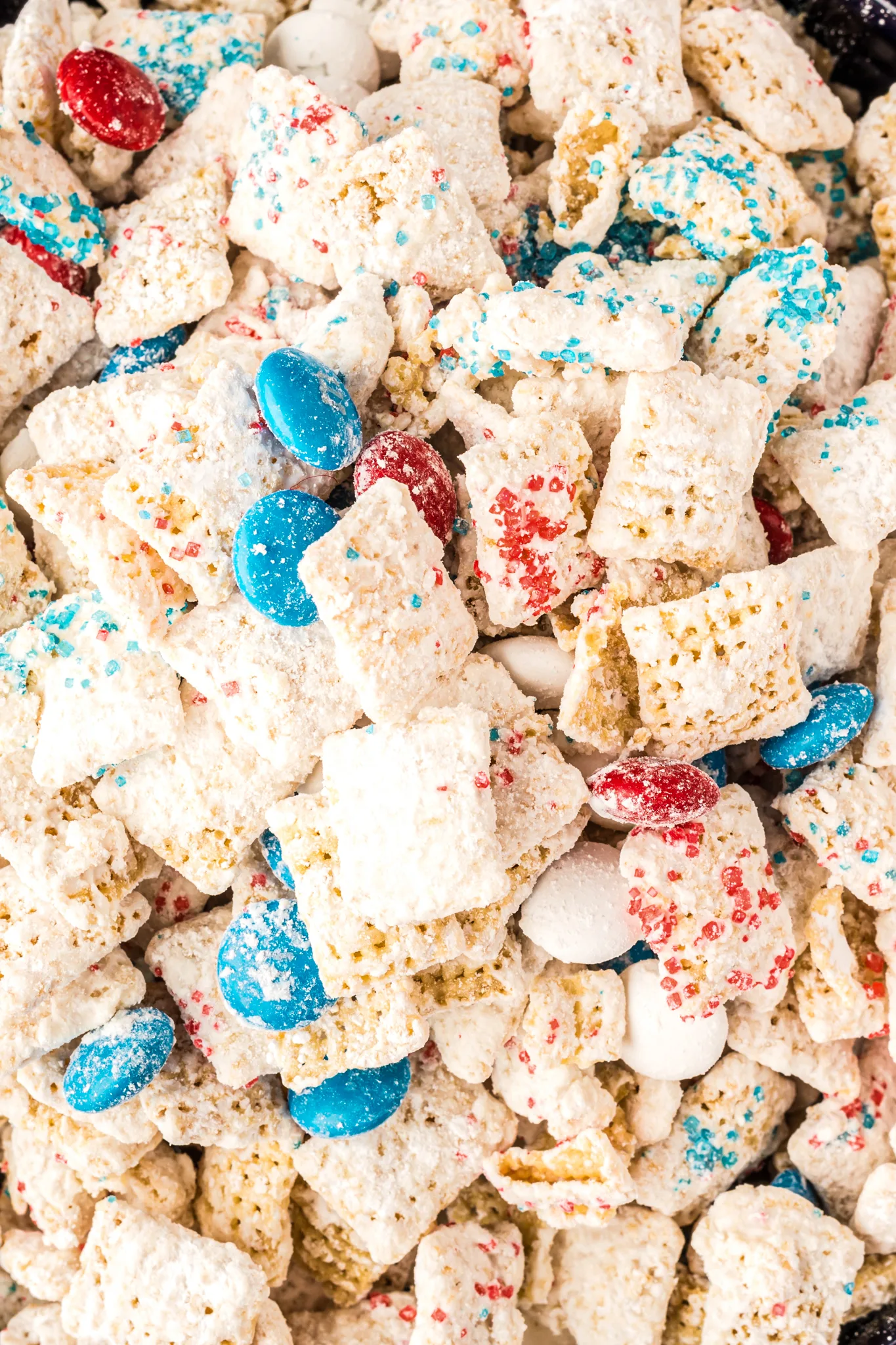 A close up photo of white chocolate chex mix