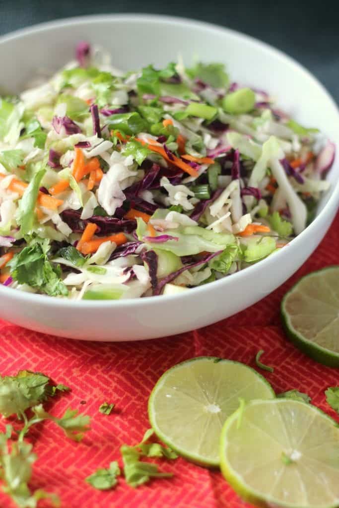 Cilantro Lime Coleslaw Recipe: A super healthy and easy side dish, perfect substitute for heavy rice or beans! #mexican #salad #vegetarian #vegan 