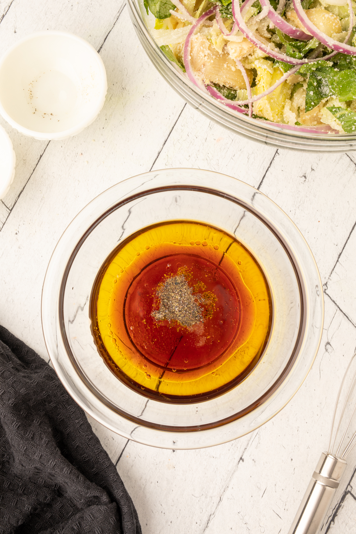 an overhead photo of red wine vinaigrette in a bowl