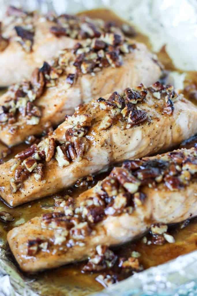 A photo of baked salmon with pecan brown sugar glaze