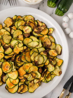 air fried zucchini chips on a plate
