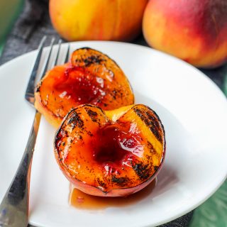 An image of grilled peaches with a sweet tea glaze