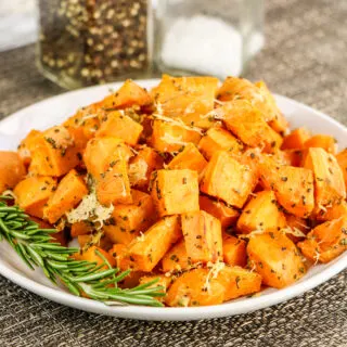 A plate heaping with Air Fryer Sweet Potato Cubes