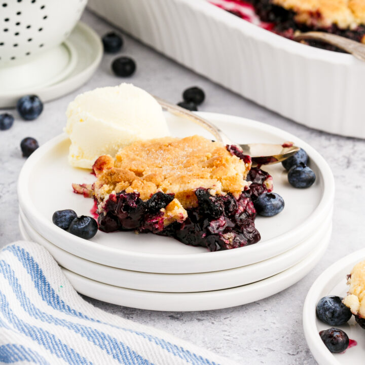 A photo of blueberry cobbler on a plate