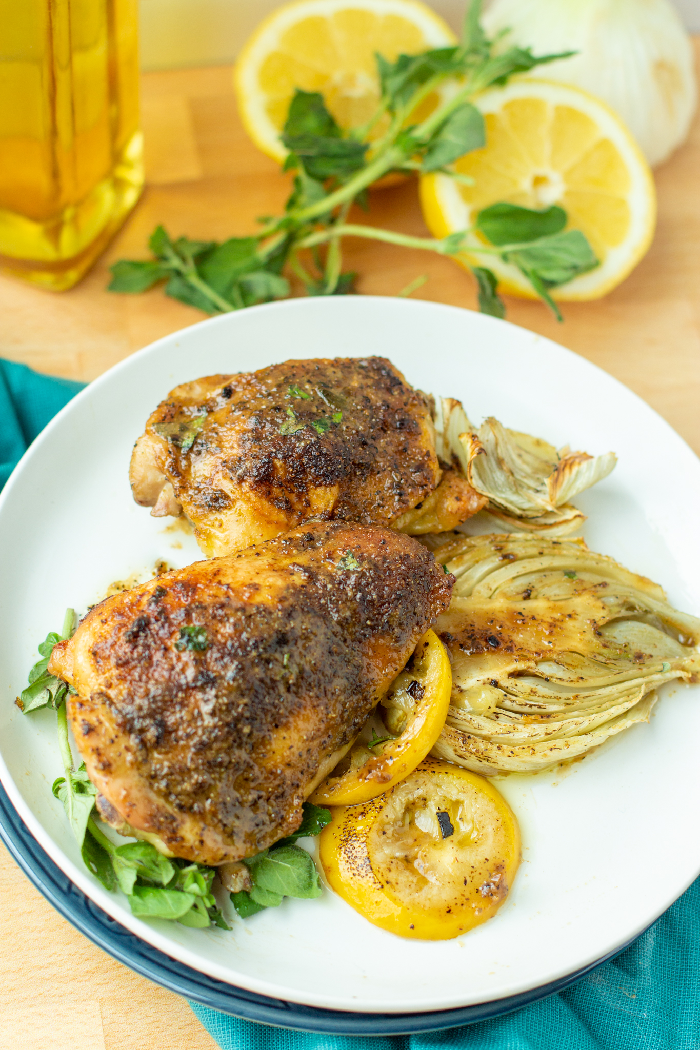 a photo of Roasted Greek Chicken Thighs with Charred Lemon and Fennel
