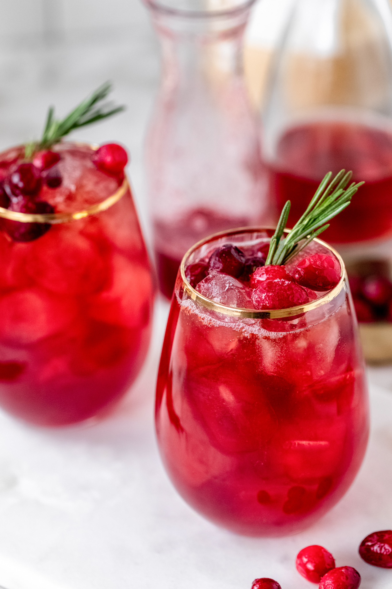 a photo of cranberry cocktail in a rocks glass