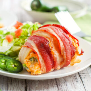 A closeup photo of bacon wrapped chicken