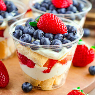 a photo of an individual trifle with fresh berries