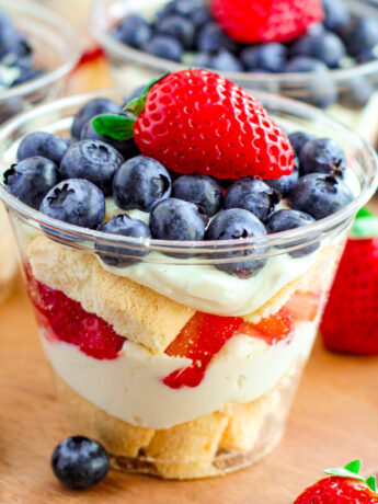 a photo of an individual trifle with fresh berries