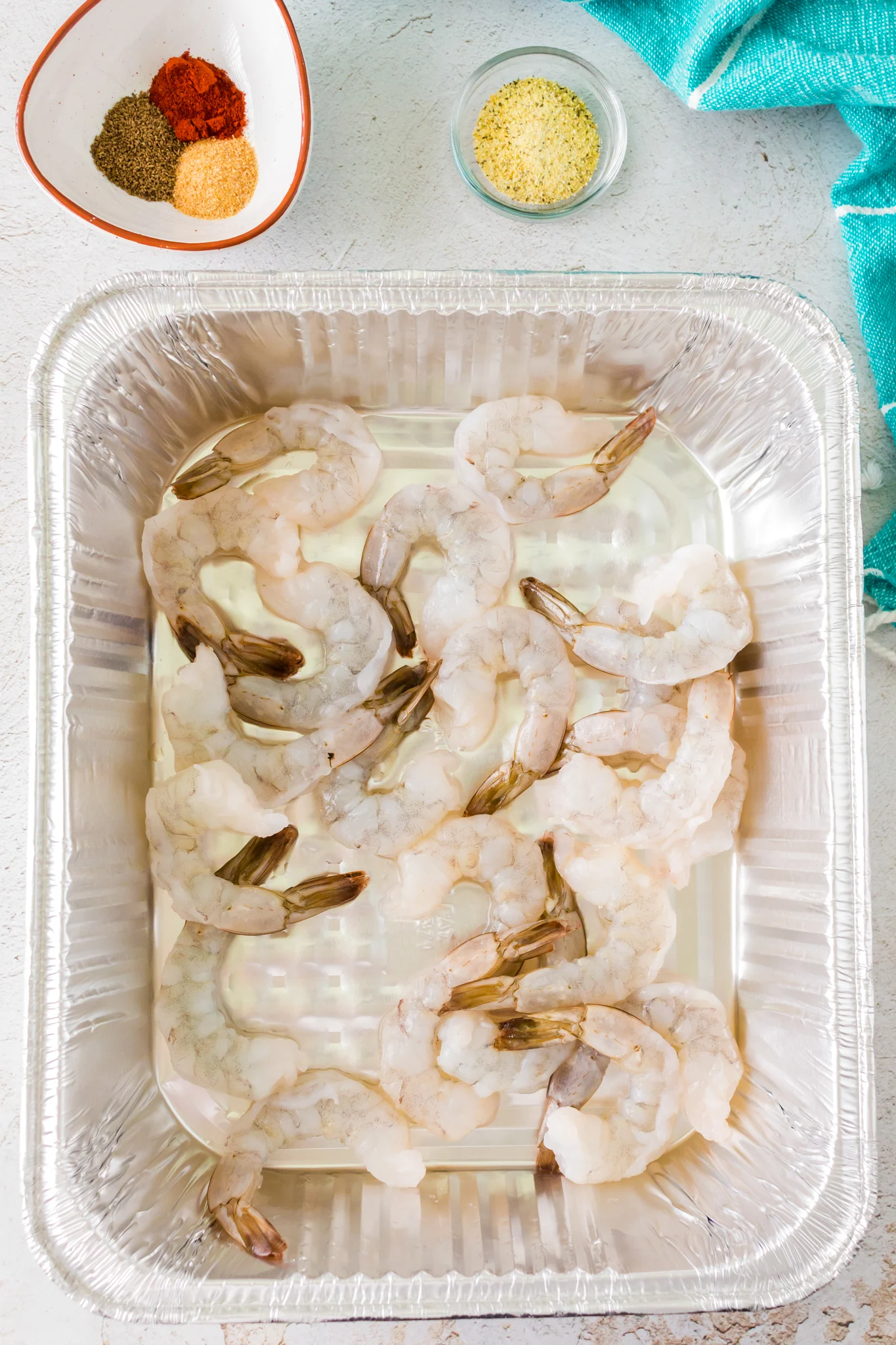 a photo of raw shrimp in a pan