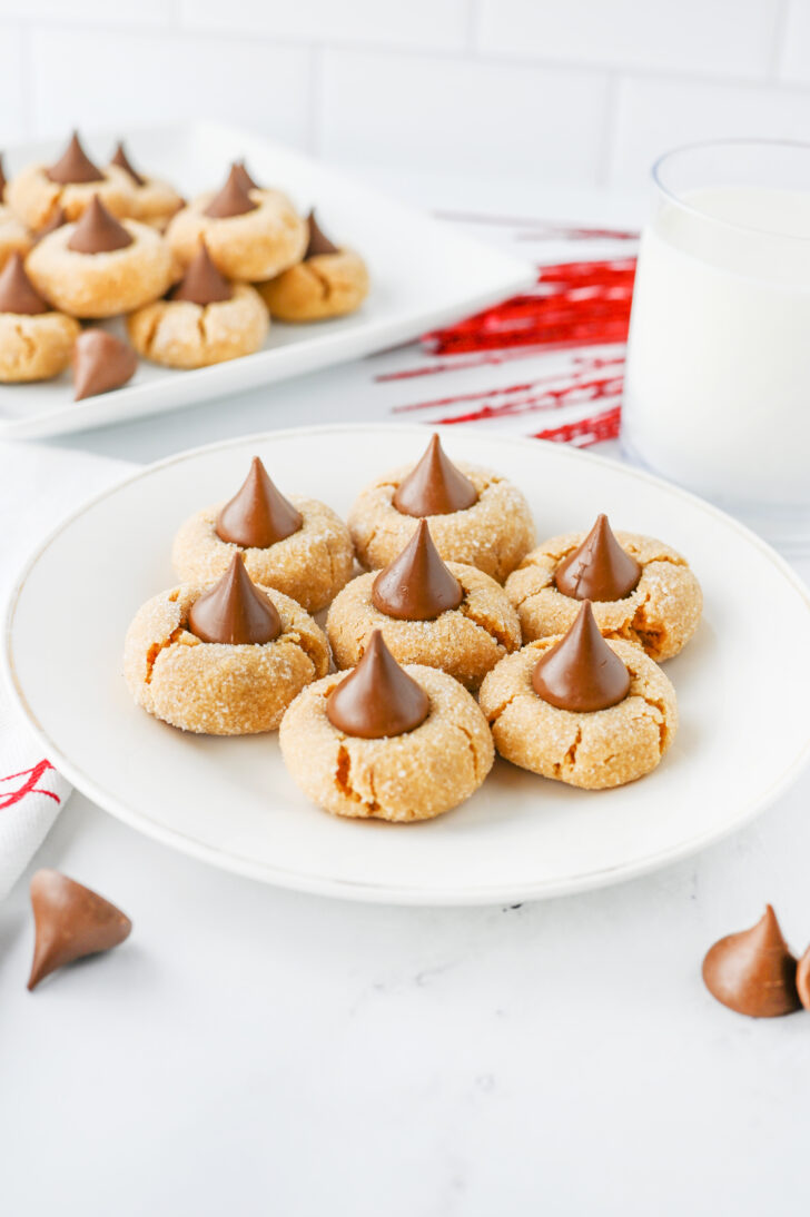 peanut butter blossom cookies on a white plate