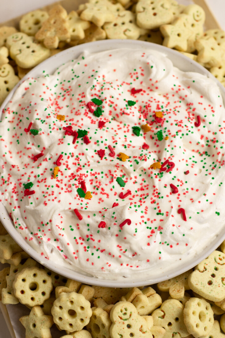 a white bowl filled with Christmas Sugar Cookie Dip