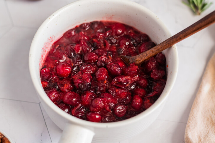 cranberry compote in a white pot