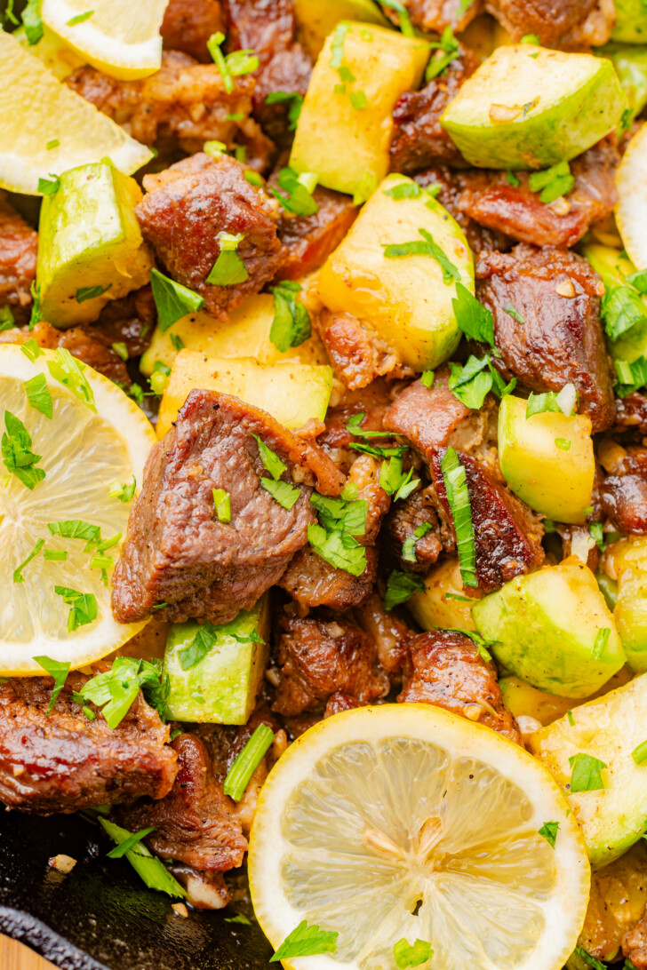 garlic steak bites in a skillet