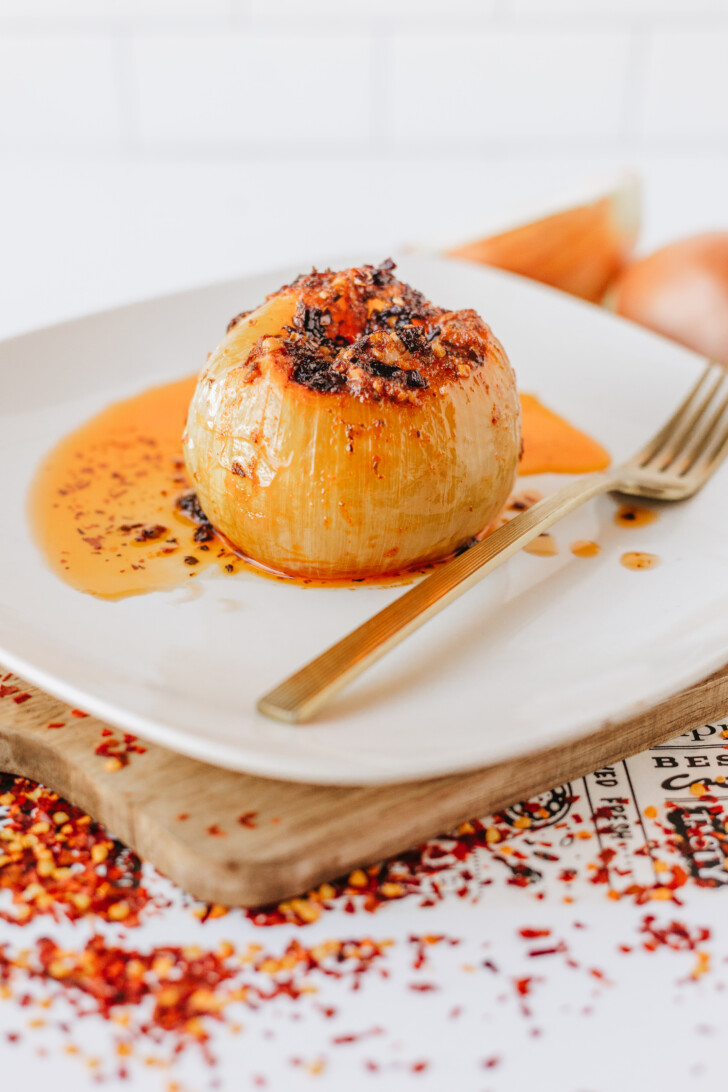 baked onion on a plate