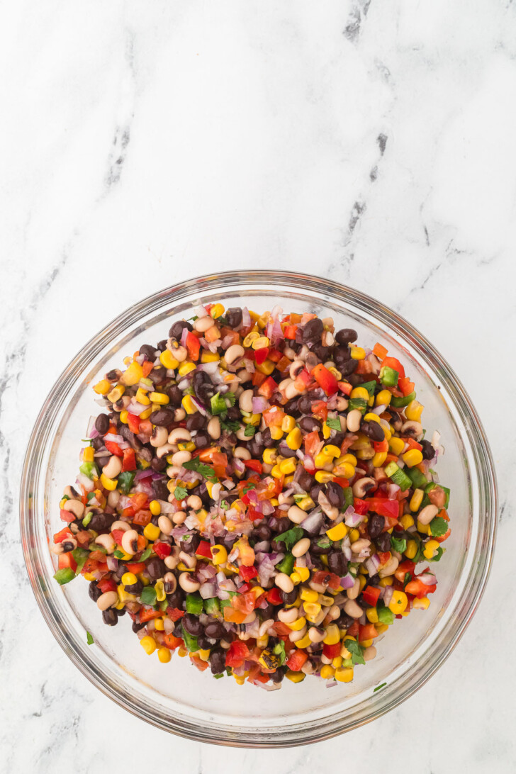 beans tomatoes and corn in a bowl