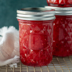 raspberry jam in a glass jar