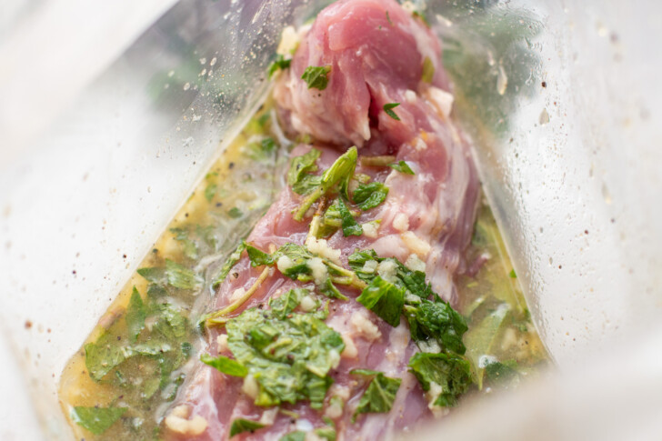 pork tenderloin in a Ziploc bag with a marinade