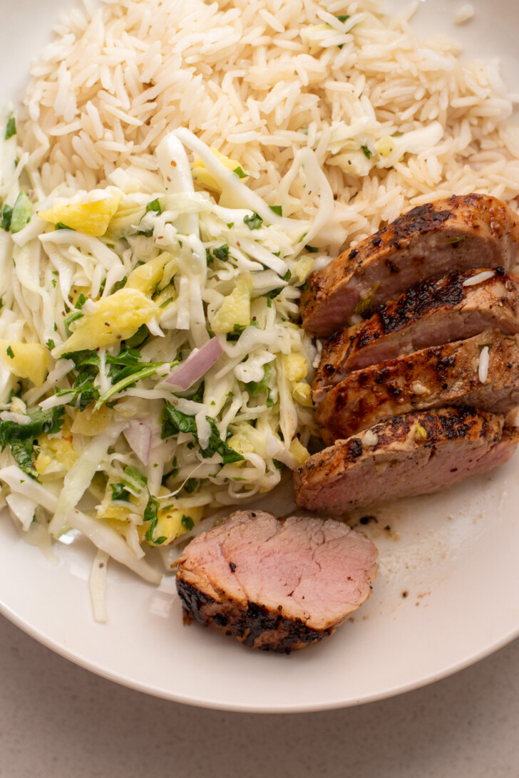 sliced pork tenderloin on a plate