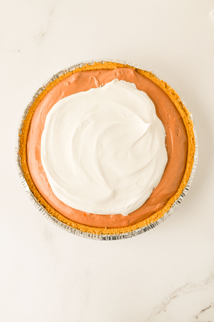 chocolate cream pie topped with whipped cream