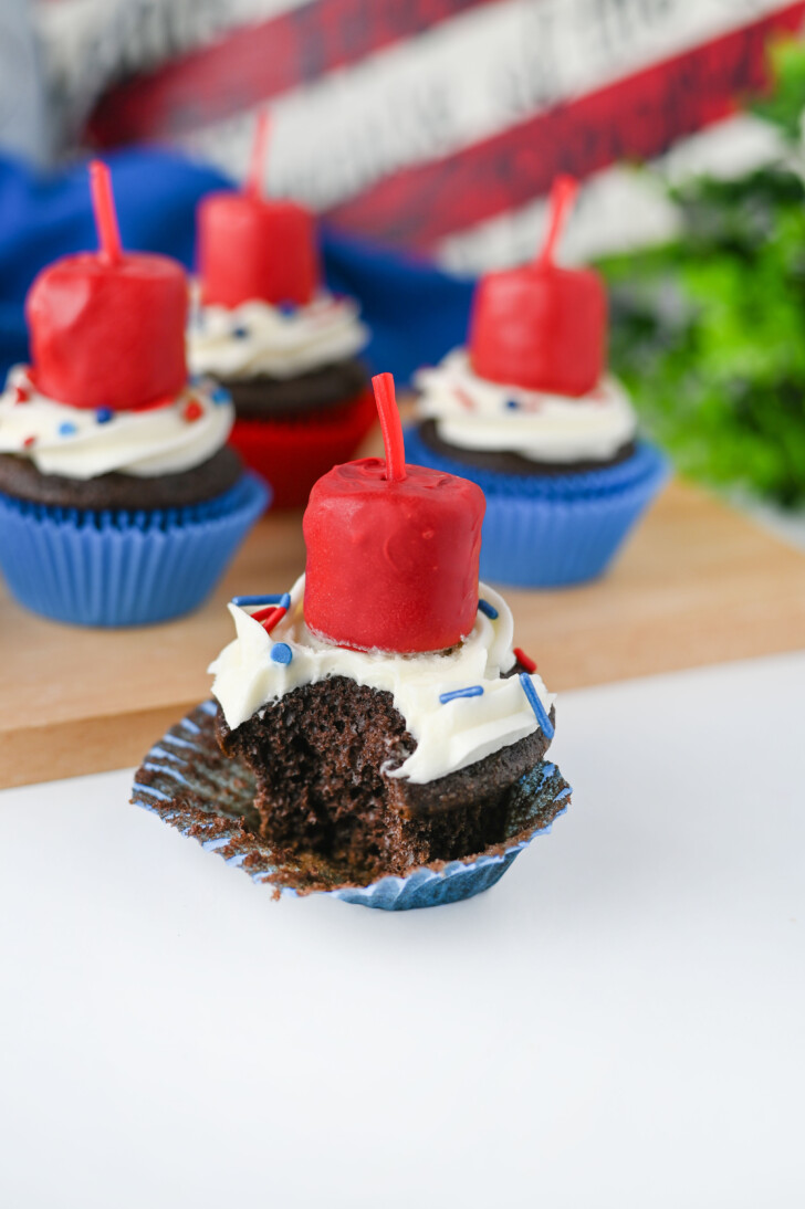 a chocolate cupcake with patriotic toppings
