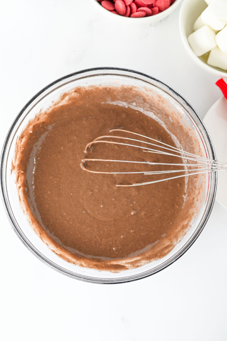 chocolate cake batter in a clear bowl