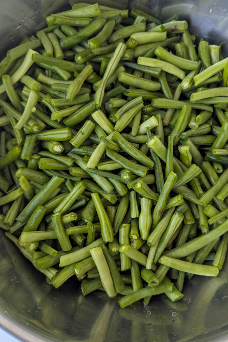a bowl of cut fresh green beans