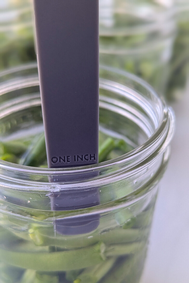 Measuring head space in a canning jar