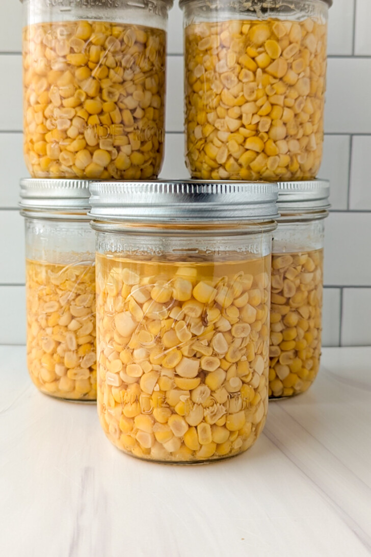stacked jars of sweet corn kernels