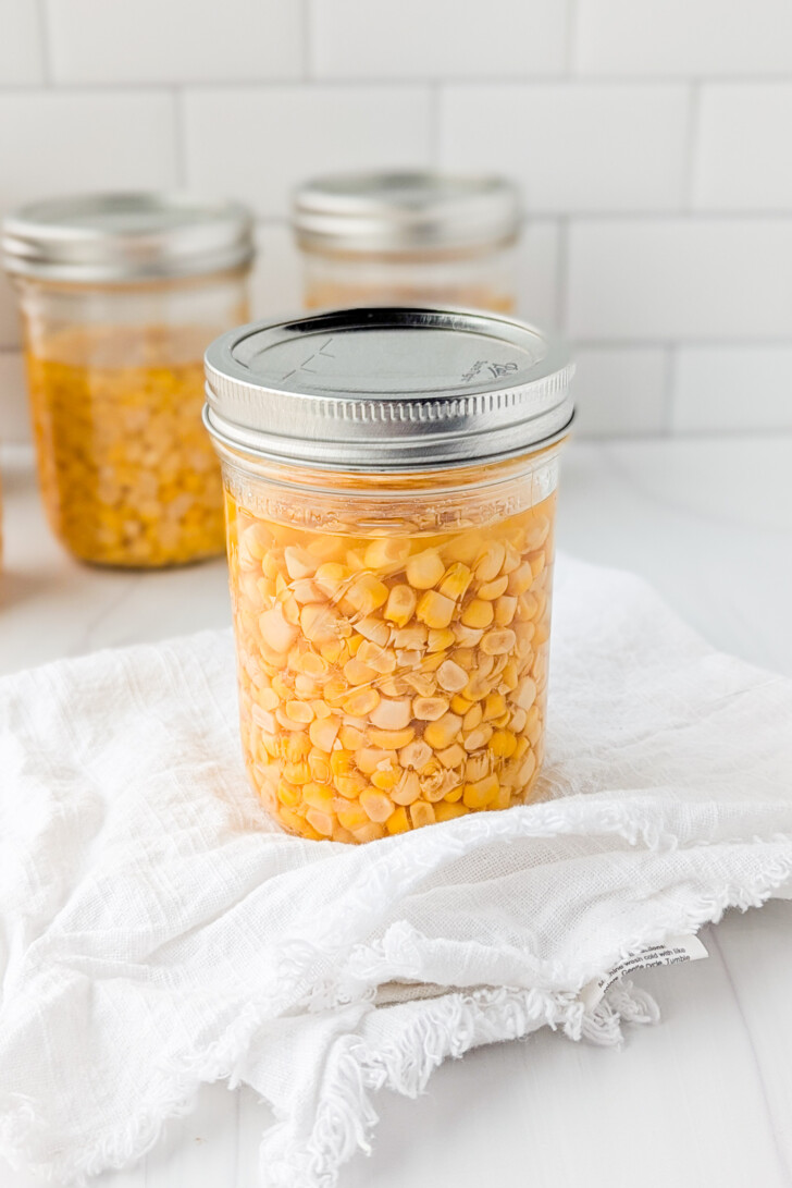 a jar of canned corn