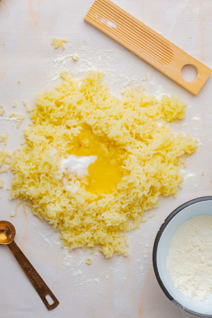 riced potato with a beaten egg and salt