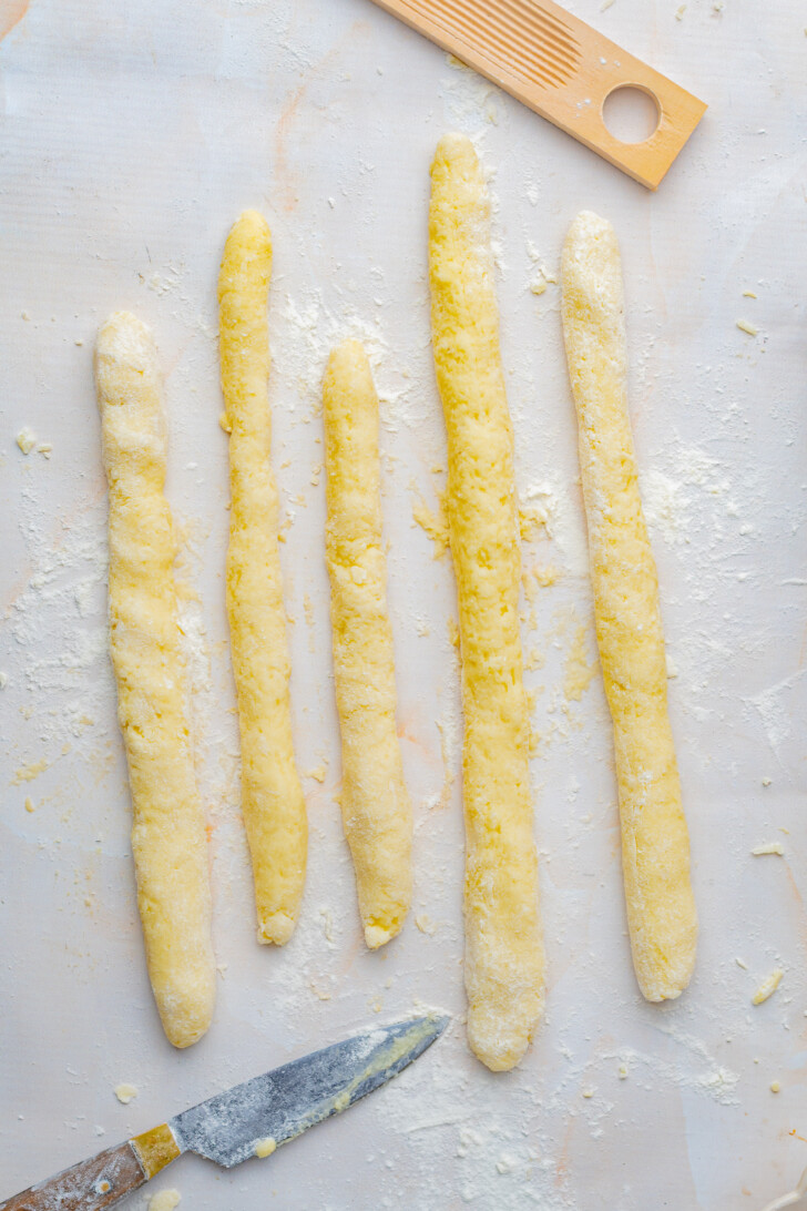 rolled out rows of gnocchi dough