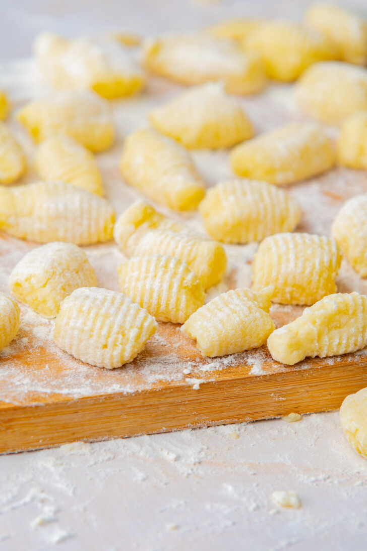 homemade potato gnocchis on a wood board