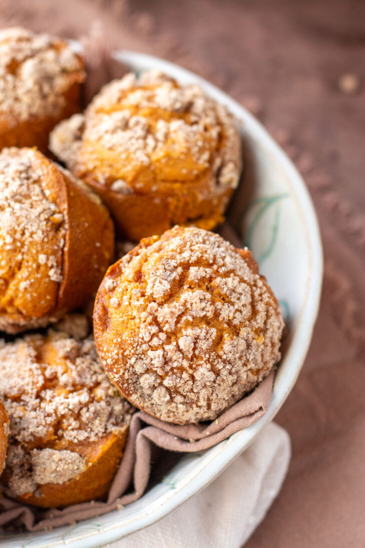 a bowl of pumpkin muffins