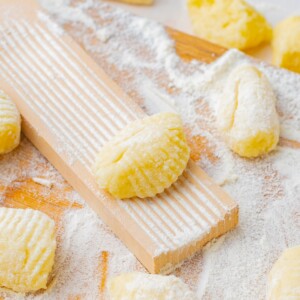 potato gnocchi on a gnocchi shaping board